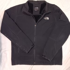 The north face men's jacket size large black zip up with zippered pockets